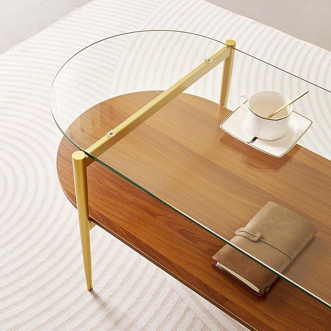 Oval Glass Coffee Table, Mid-Century Modern Design, L41 x W21 x H17 inch, for Living Room, 2-Tier Structure, Clear Glass Top and Walnut Finish Wood Shelf, Conical Legs with Gold Finish Frame