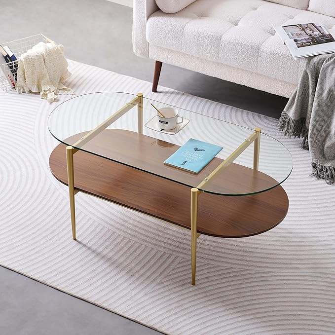 Oval Glass Coffee Table, Mid-Century Modern Design, L41 x W21 x H17 inch, for Living Room, 2-Tier Structure, Clear Glass Top and Walnut Finish Wood Shelf, Conical Legs with Gold Finish Frame